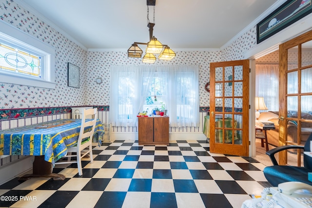 dining area featuring crown molding