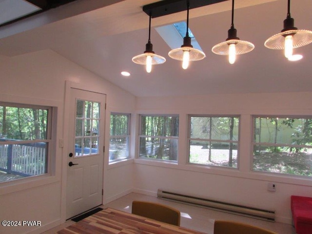 interior space featuring vaulted ceiling and baseboard heating