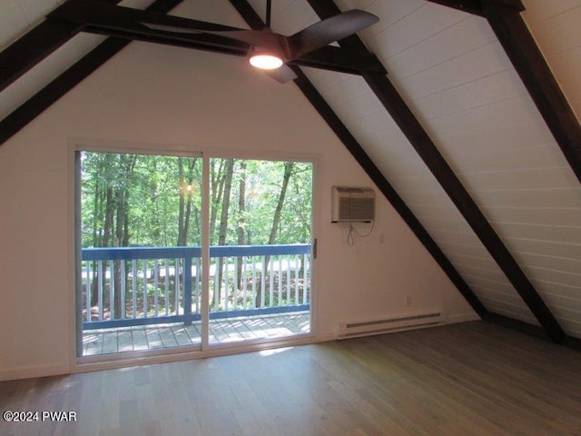 additional living space with a baseboard heating unit, an AC wall unit, vaulted ceiling with beams, ceiling fan, and wood-type flooring