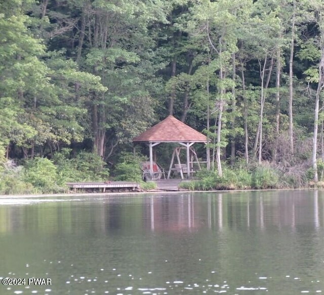 property view of water with a gazebo