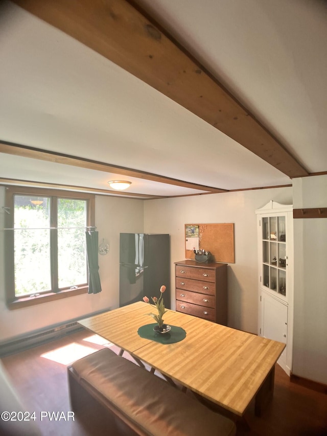 dining room with beamed ceiling