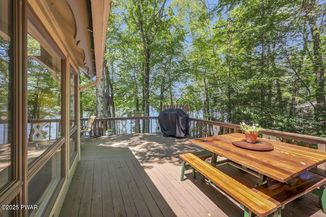 37 Rockpoint Ct, Lake Ariel, PA 18436 - wooden deck with area for grilling, outdoor dining area, and view of scattered trees