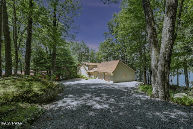 37 Rockpoint Ct, Lake Ariel, PA 18436 - view of side of property with gravel driveway and a garage