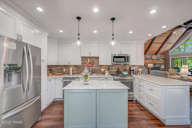 37 Rockpoint Ct, Lake Ariel, PA 18436 - kitchen with stainless steel appliances, a peninsula, dark wood-style flooring, white cabinetry, and recessed lighting