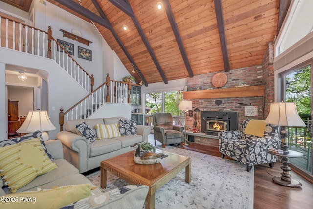 37 Rockpoint Ct, Lake Ariel, PA 18436 - living area with wood finished floors, a wood ceiling with exposed beams, plenty of natural light, stairs, and high vaulted ceiling