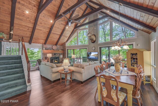37 Rockpoint Ct, Lake Ariel, PA 18436 - living area featuring a wooden ceiling with exposed beams, high vaulted ceiling, plenty of natural light, dark wood finished floors, and a fireplace