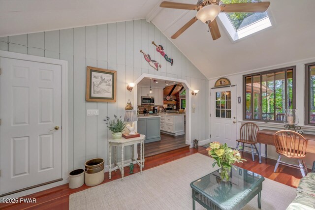 37 Rockpoint Ct, Lake Ariel, PA 18436 - living room with wood finished floors, ceiling fan, plenty of natural light, and wood walls