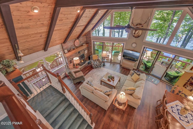 37 Rockpoint Ct, Lake Ariel, PA 18436 - living room with high vaulted ceiling, ceiling fan, a wood ceiling with exposed beams, wood finished floors, and a water view