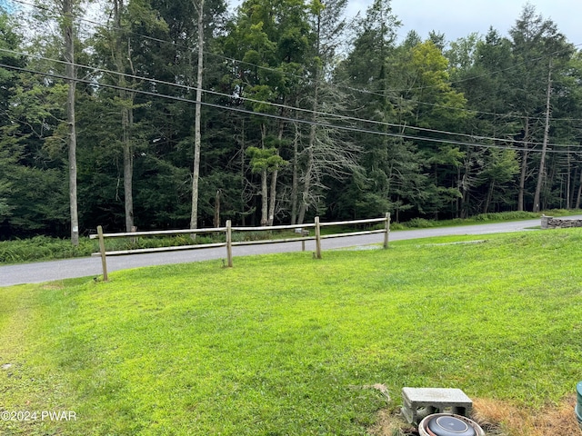 view of community featuring a lawn