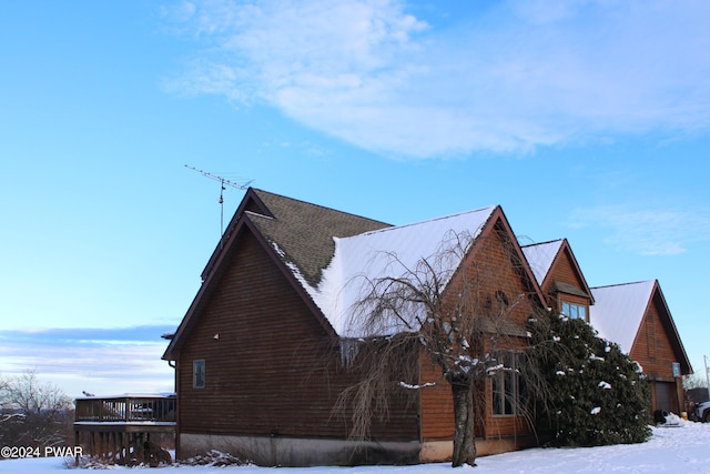 view of snow covered property