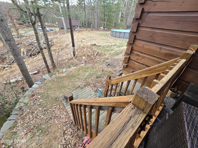 view of yard featuring a pool side deck