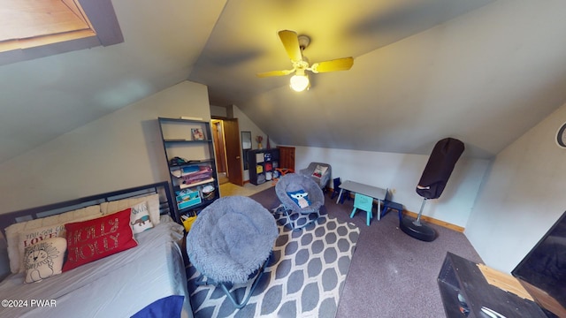 interior space with carpet flooring, ceiling fan, and vaulted ceiling