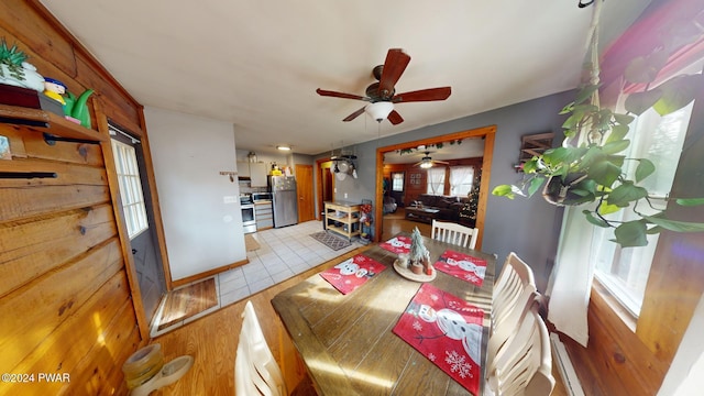 dining space with ceiling fan