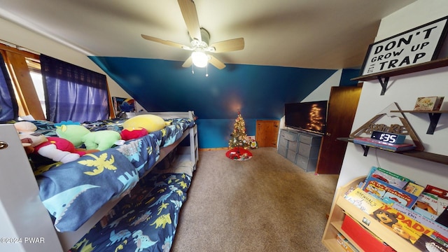 carpeted bedroom featuring ceiling fan and lofted ceiling