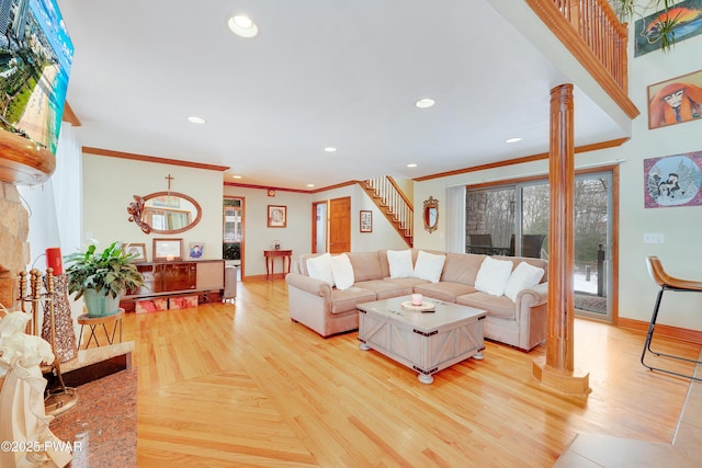 living room featuring crown molding, recessed lighting, decorative columns, and baseboards