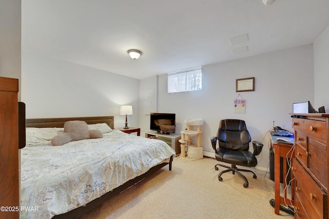 carpeted bedroom featuring baseboards and a baseboard heating unit