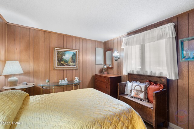 71 Boulder Point Rd, Lakeville, PA 18438 - bedroom with wood walls and a textured ceiling