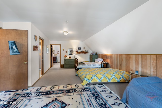 71 Boulder Point Rd, Lakeville, PA 18438 - carpeted bedroom featuring vaulted ceiling and wood walls