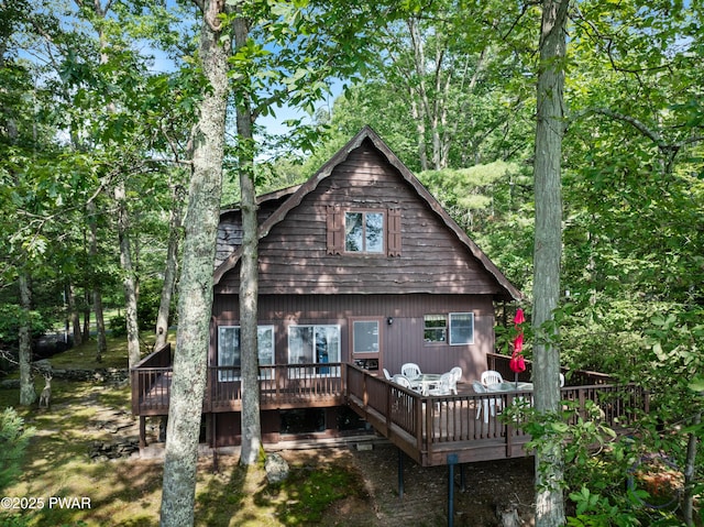 71 Boulder Point Rd, Lakeville, PA 18438 - back of property with a wooden deck