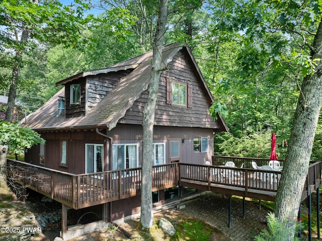 71 Boulder Point Rd, Lakeville, PA 18438 - back of house with a deck and roof with shingles