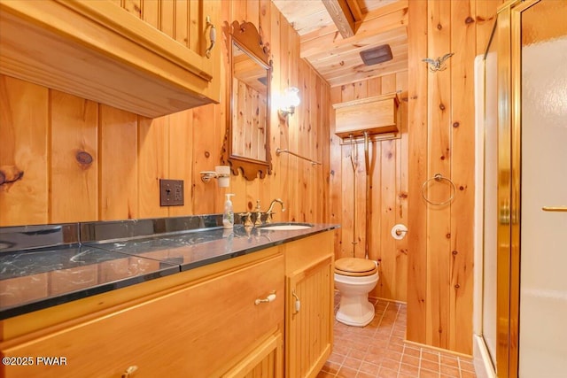 349 Starlight Lake Rd, Starlight, PA 18461 - full bathroom with toilet, vanity, tile patterned floors, a shower stall, and wood walls