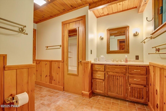 349 Starlight Lake Rd, Starlight, PA 18461 - bathroom with wooden ceiling, vanity, a wainscoted wall, ornamental molding, and wood walls