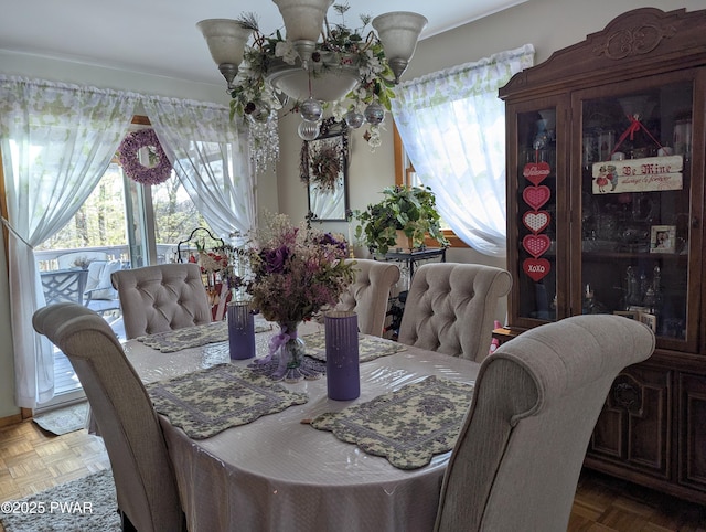 dining area featuring a healthy amount of sunlight