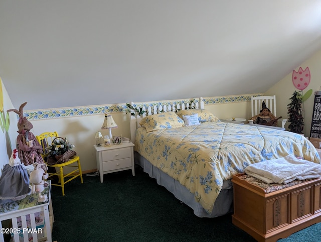 carpeted bedroom with lofted ceiling