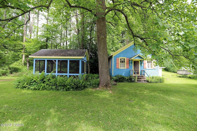 view of front of home with a front lawn