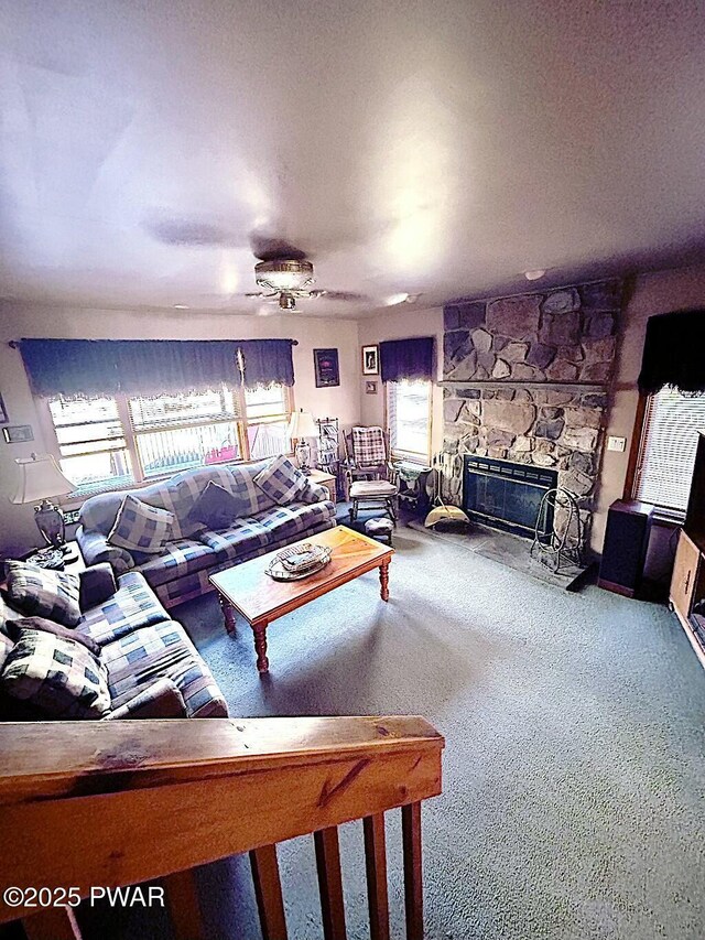 carpeted bedroom featuring lofted ceiling and a wood stove