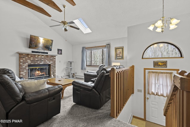 104 Rockway Rd, Lake Ariel, PA 18436 - living area featuring a fireplace, baseboards, high vaulted ceiling, ceiling fan with notable chandelier, and a skylight
