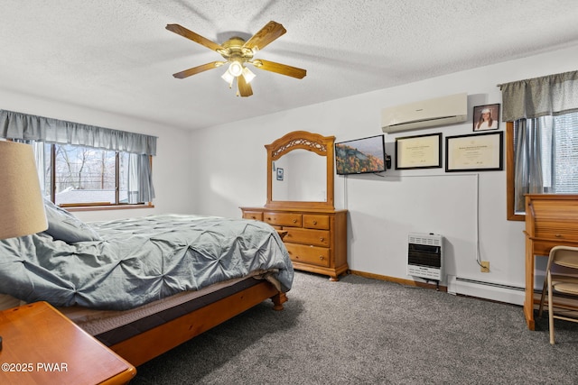 104 Rockway Rd, Lake Ariel, PA 18436 - carpeted bedroom featuring a wall mounted air conditioner, heating unit, a ceiling fan, and a textured ceiling