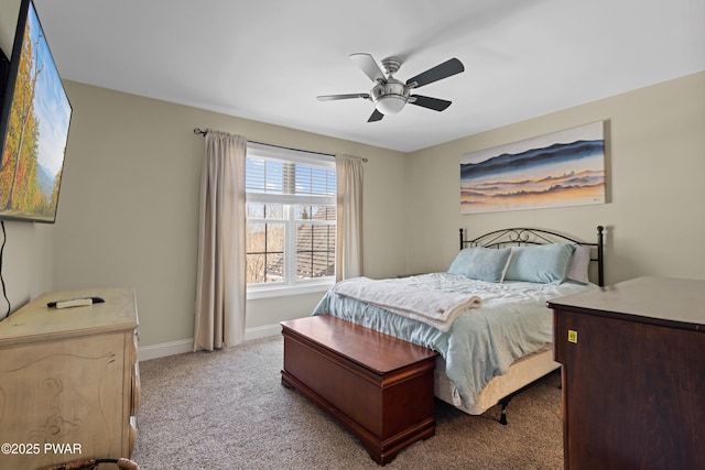 bedroom featuring carpet floors, baseboards, and a ceiling fan