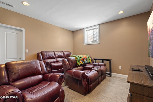 home theater room featuring recessed lighting, baseboards, visible vents, and light colored carpet