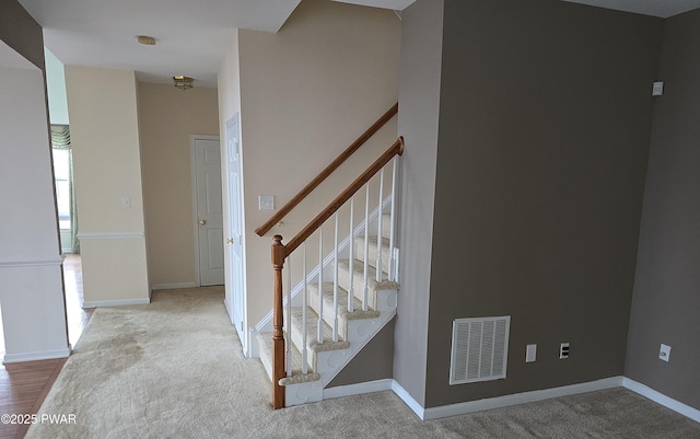 1712 Big Ridge Dr, East Stroudsburg, PA 18302 - stairs featuring visible vents, carpet, and baseboards