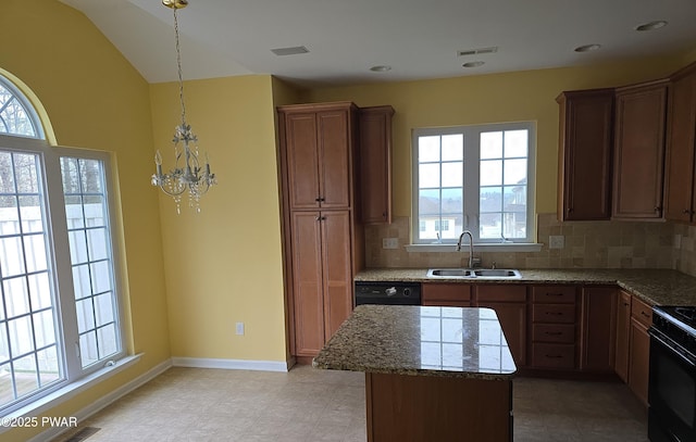 1712 Big Ridge Dr, East Stroudsburg, PA 18302 - kitchen with an inviting chandelier, a sink, a wealth of natural light, and black appliances