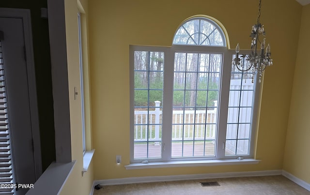 1712 Big Ridge Dr, East Stroudsburg, PA 18302 - doorway with baseboards, visible vents, and a chandelier