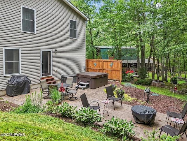 111 Sun Valley Dr, Tafton, PA 18464 - back of property with a hot tub, a patio, and entry steps