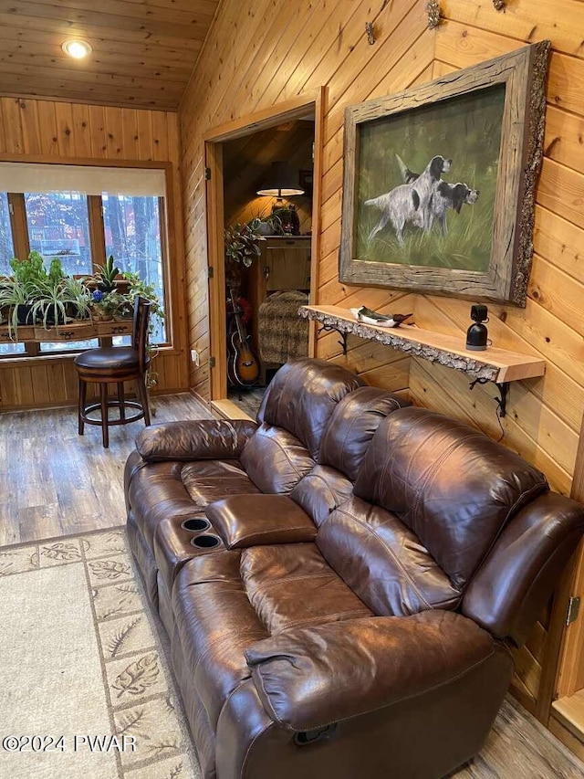 living room with hardwood / wood-style flooring and wooden ceiling