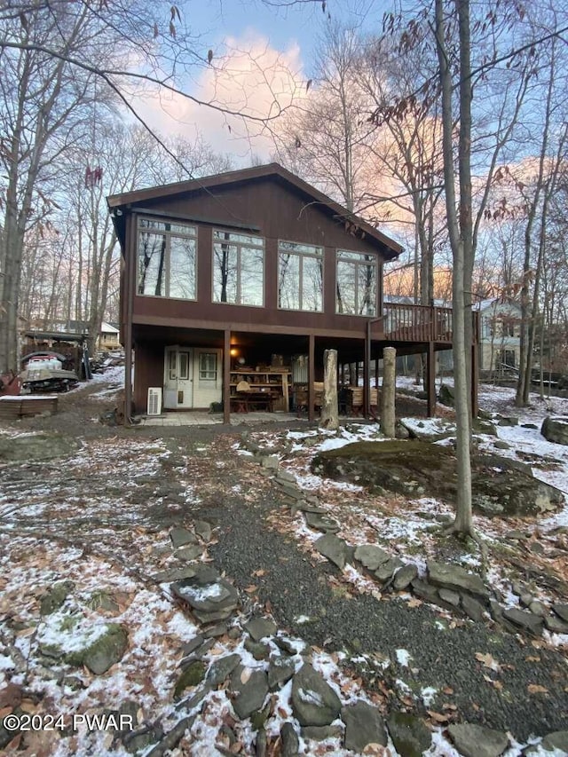 view of front of house featuring a wooden deck