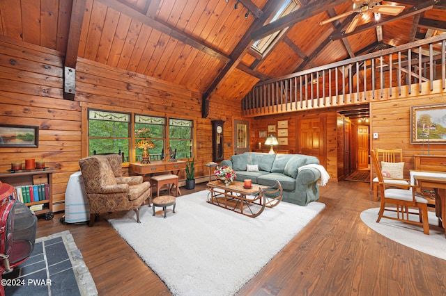 living room featuring beam ceiling, dark hardwood / wood-style flooring, high vaulted ceiling, and wooden ceiling