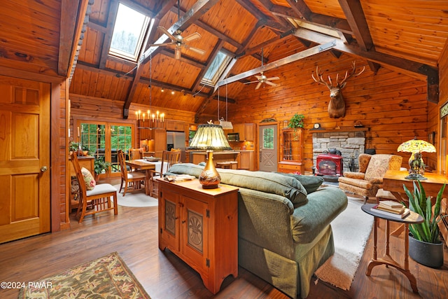 living room with beam ceiling, a skylight, wooden ceiling, and wood-type flooring