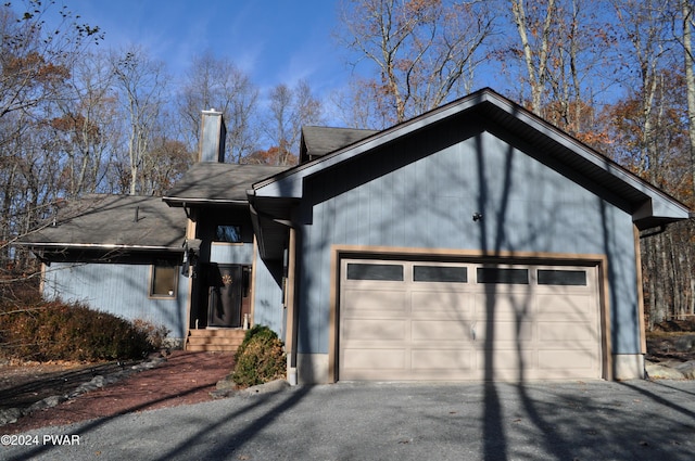 view of front of home with a garage