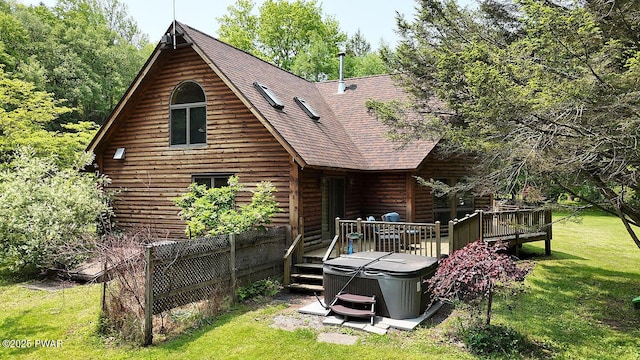 33 Syloro Ln, Damascus, PA 18415 - back of property featuring a deck, a shingled roof, a yard, log siding, and a hot tub