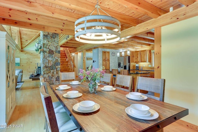 33 Syloro Ln, Damascus, PA 18415 - dining space featuring wooden ceiling with exposed beams, decorative columns, and light wood-style floors