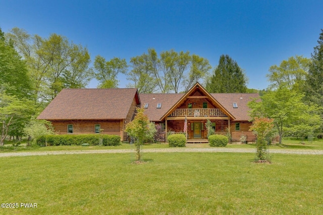 33 Syloro Ln, Damascus, PA 18415 - cabin with log siding and a front yard