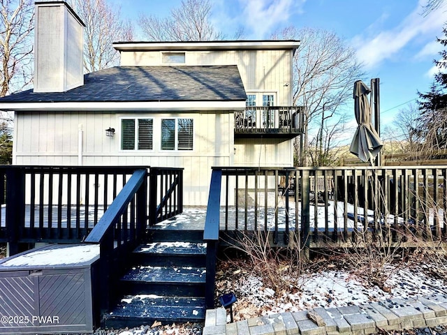 view of snow covered deck