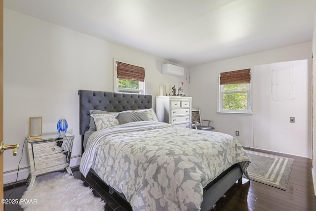 18 Tammany Flts, Damascus, PA 18415 - bedroom featuring a wall unit AC, wood finished floors, and a baseboard radiator
