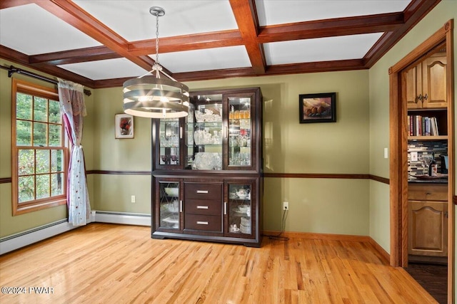 bar with light wood-type flooring, decorative light fixtures, baseboard heating, and coffered ceiling