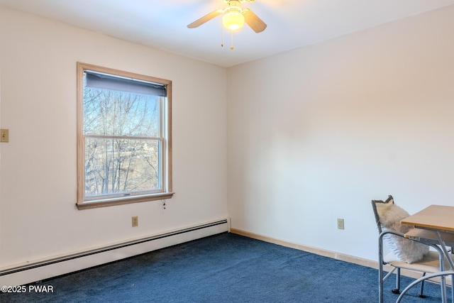 unfurnished office with carpet floors, baseboard heating, and a ceiling fan